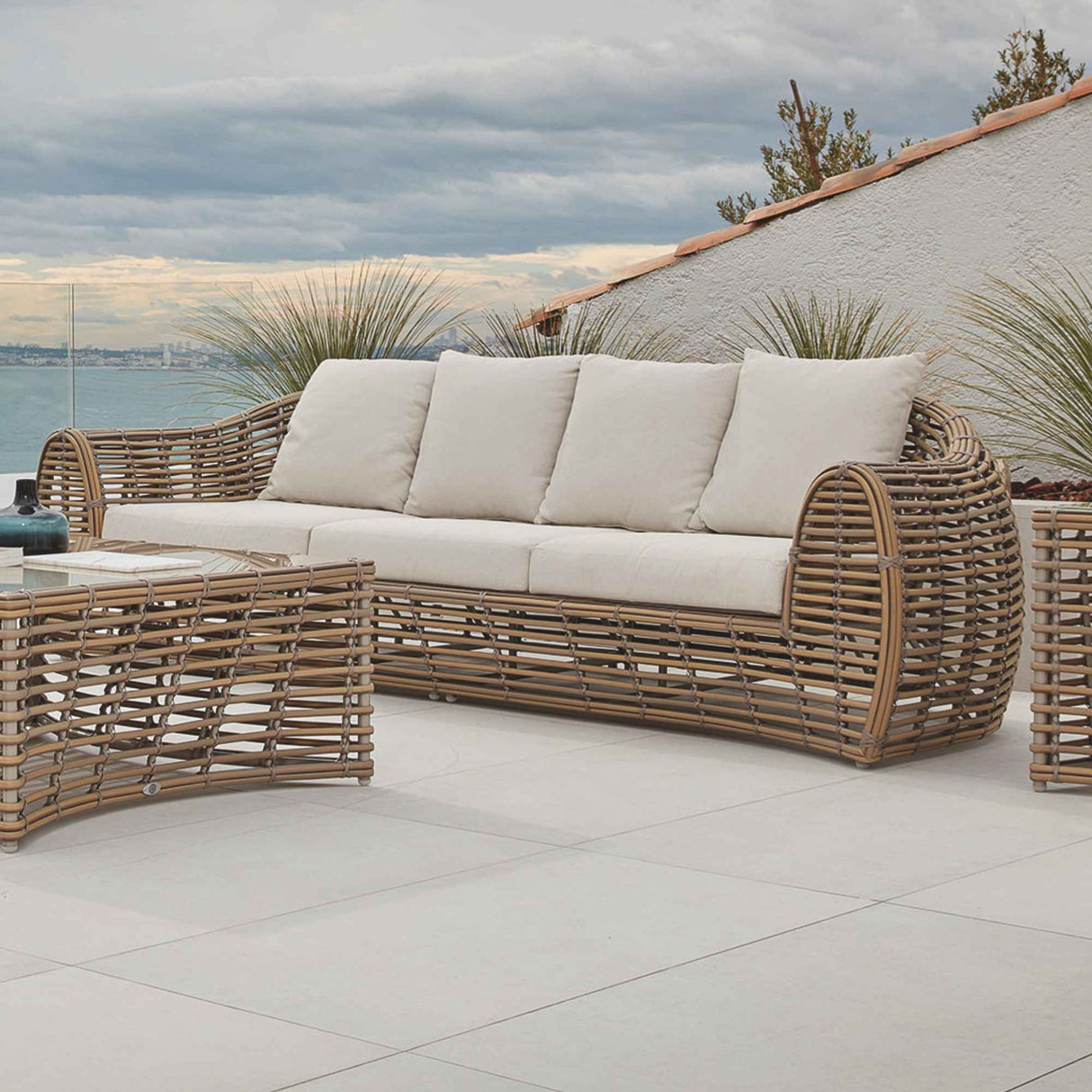 Ruby Outdoor Sofa with Sunbrella Cushion Model 23663-KMNP-CUSH by Skyline Design