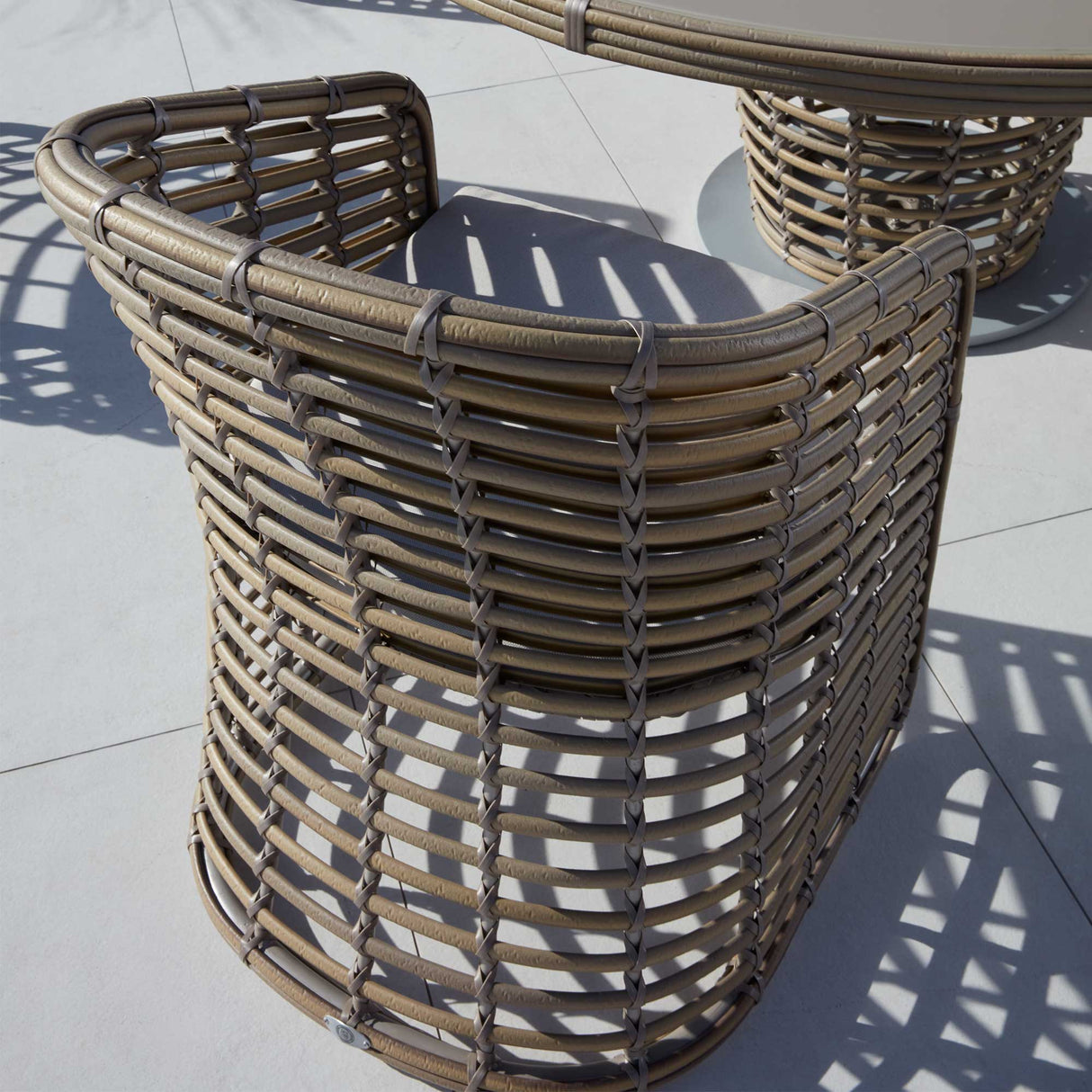 Ruby Outdoor Dining Armchair with Sunbrella Cushion Model 23671-KMNP-CUSH by Skyline Design