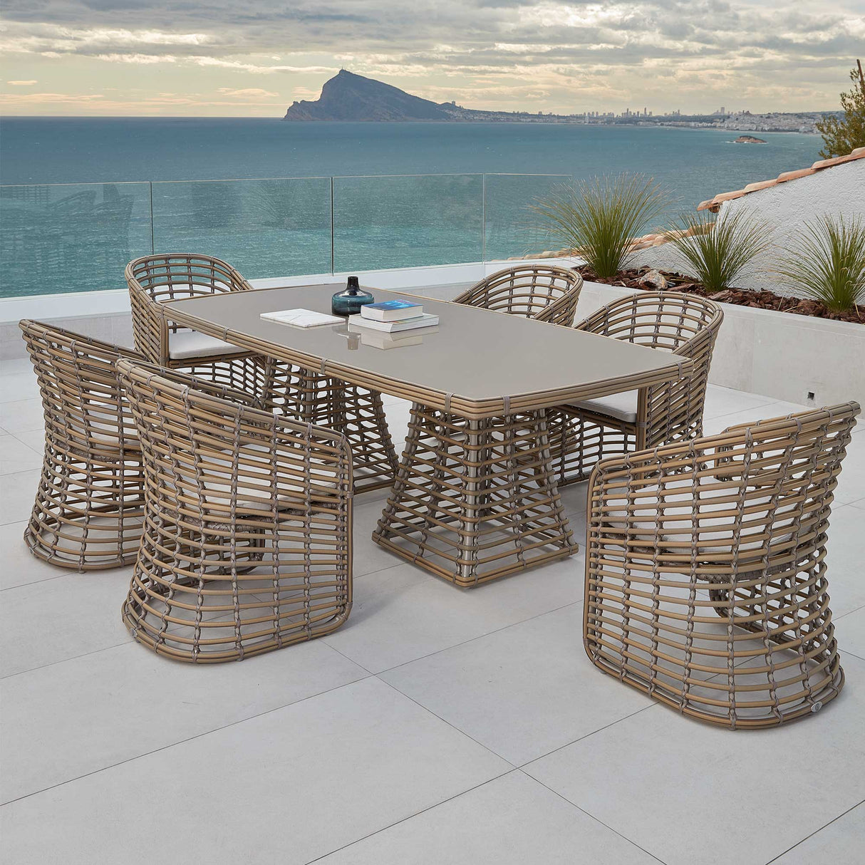 Ruby Outdoor 7-Piece Dining Set with Sunbrella Cushions Model 23673-KMNP-7PC-CUSH by Skyline Design