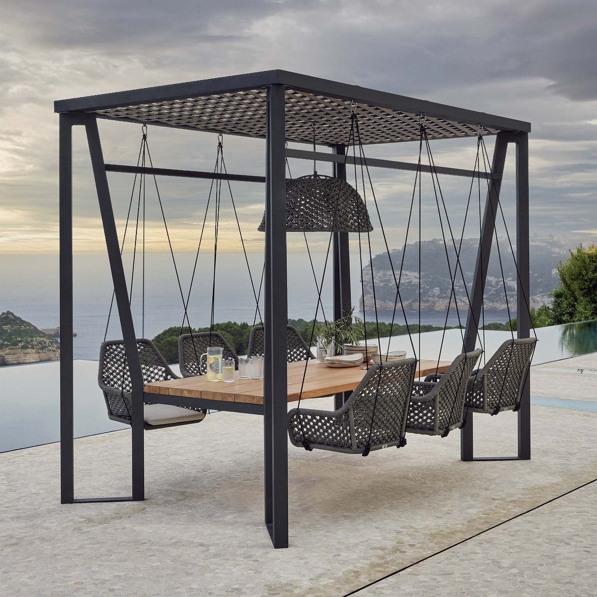 Horizon Outdoor 10FT Pergola with Lamp, Hanging Chairs & Teak Table Model 23559-DGST-CUSH by Skyline Design