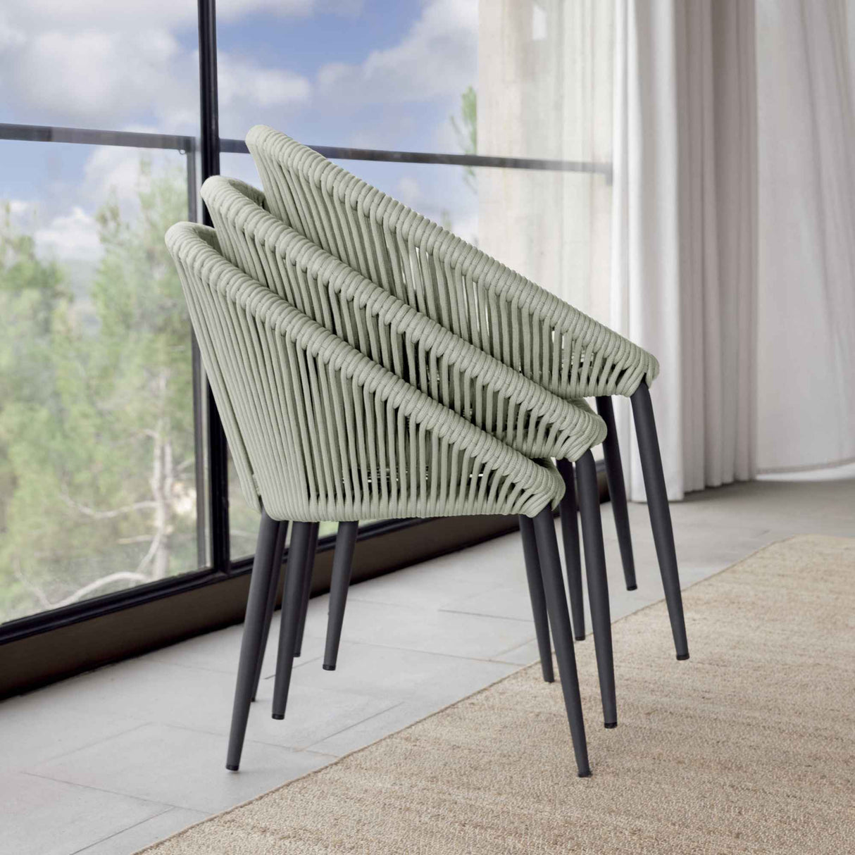 Rodona Outdoor Dining Armchair with Sunbrella Cushion Model 24177-BPR-CUSH by Skyline Design