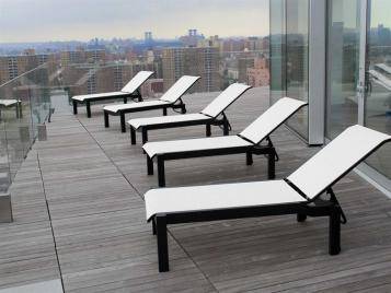 Leeward Outdoor MGP Sling Lay-flat Stacking Armless Chaise with Wheels by Telescope Casual Model 9L20